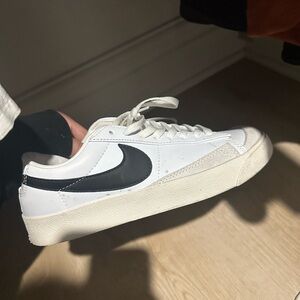 Nike women’s platform White and Black Low-Top Sneakers